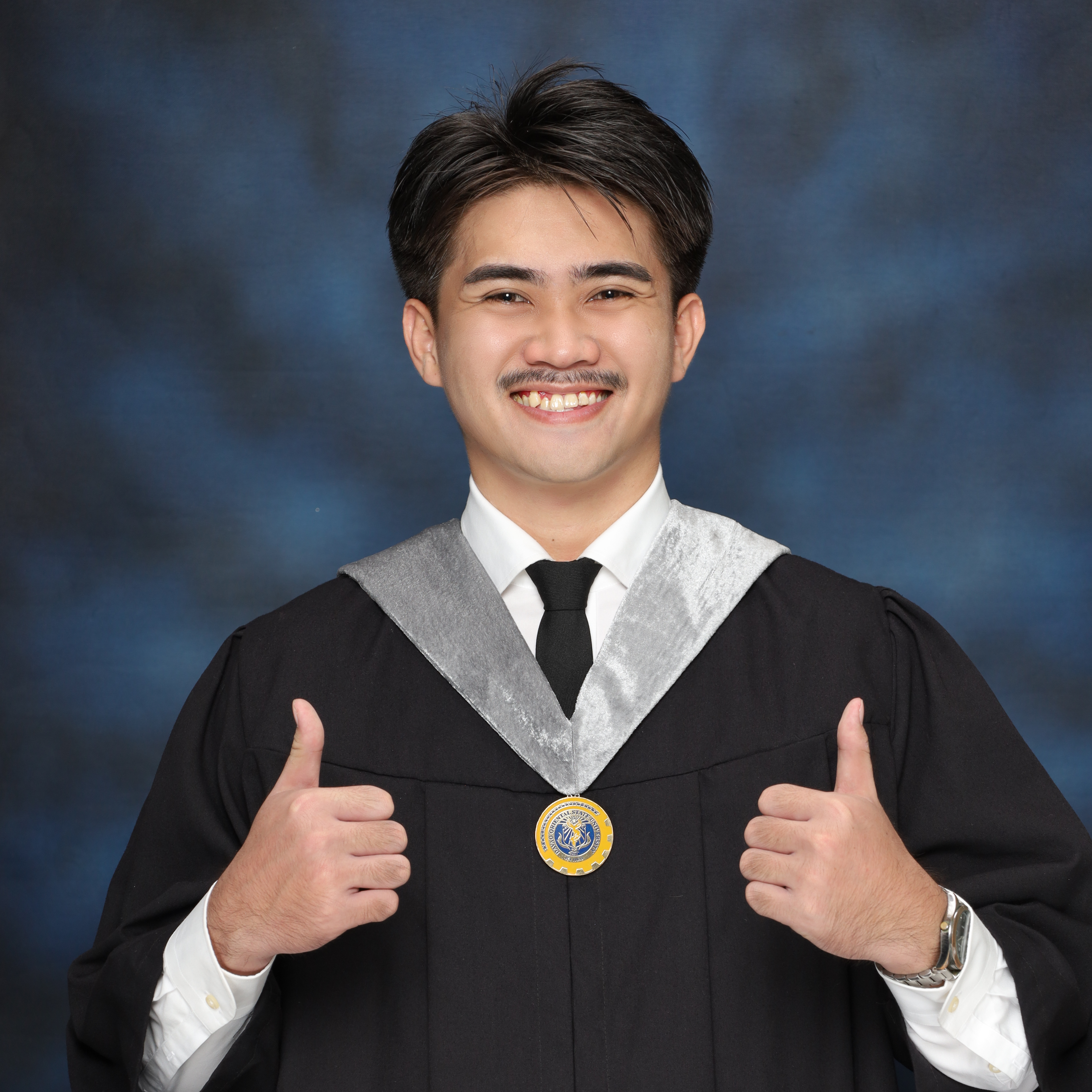 Bachelor of Science in Information Technology Major in Mobile Systems Development graduation portrait of Reymund Abelgas
